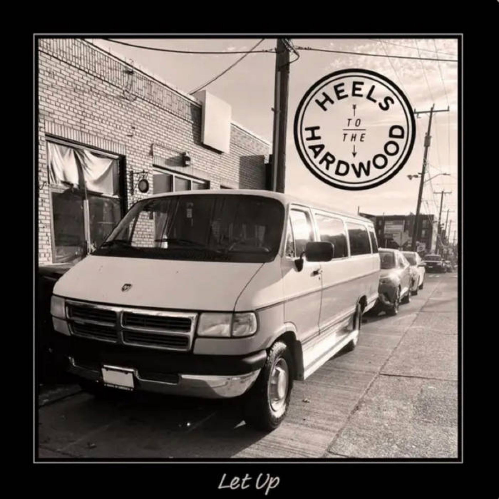 Record Cover with Van parked on a street with 'Heels To The Hardwood' logo in the corner